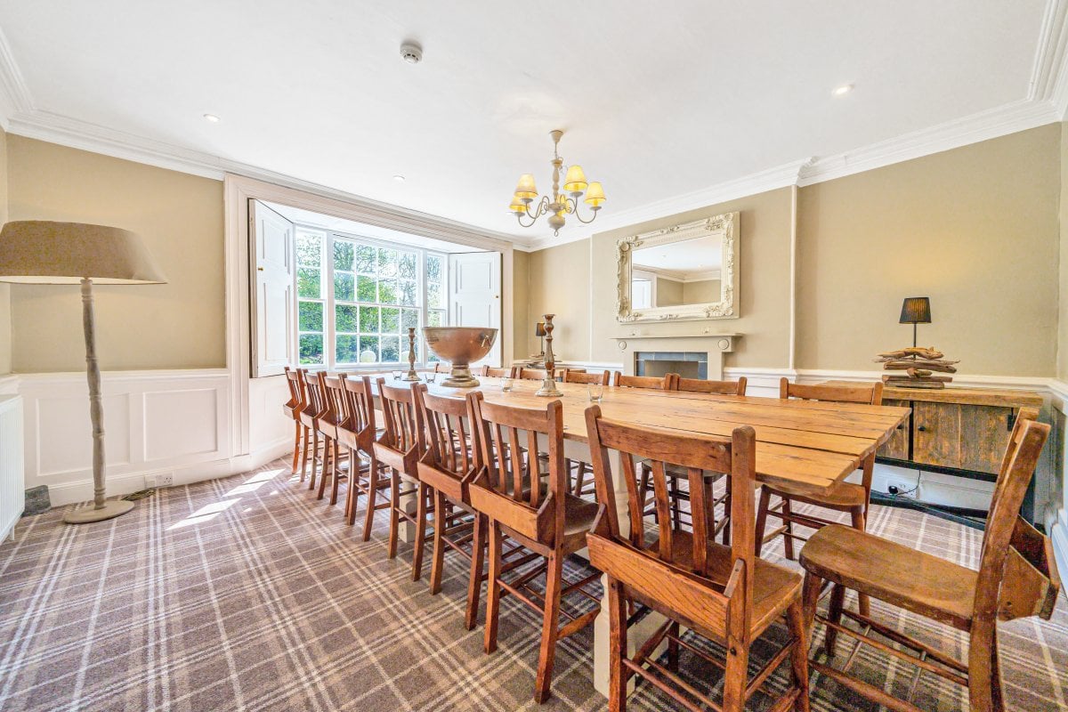 Dining table seats up to 18 guests.